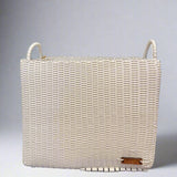 Woven basket with handles