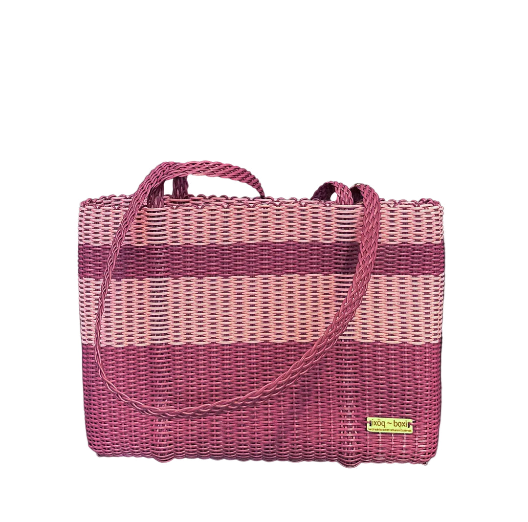 small tote with handles hanging over side